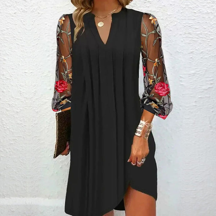 Nova Elegant V-neck mini dress with sheer sleeves