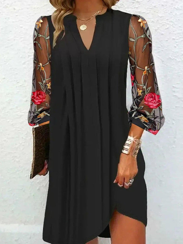 Nova Elegant V-neck mini dress with sheer sleeves